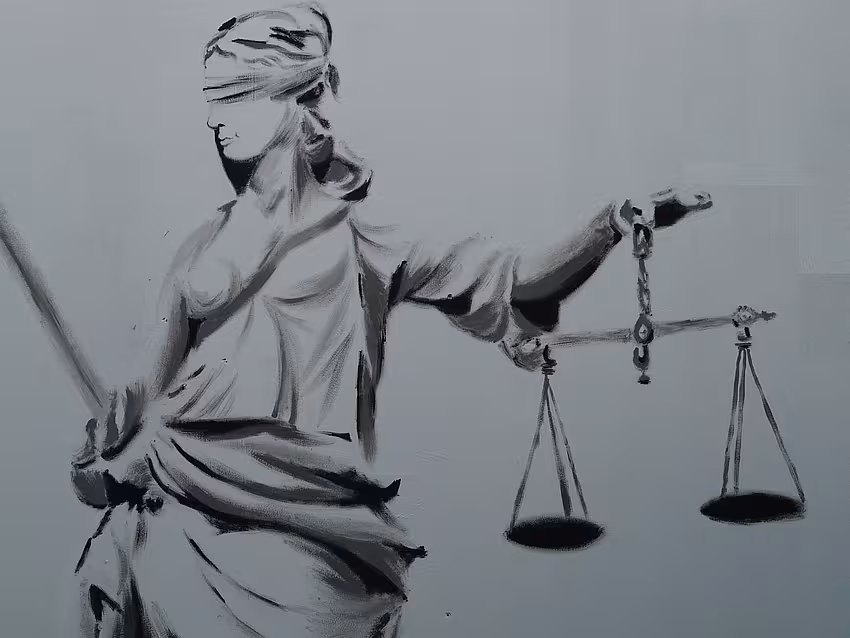 Pencil drawing of Iustitia. She wears a long, pleated dress, holds a scale in her left hand, a sword in her right hand, and has a cloth tied around her eyes.
